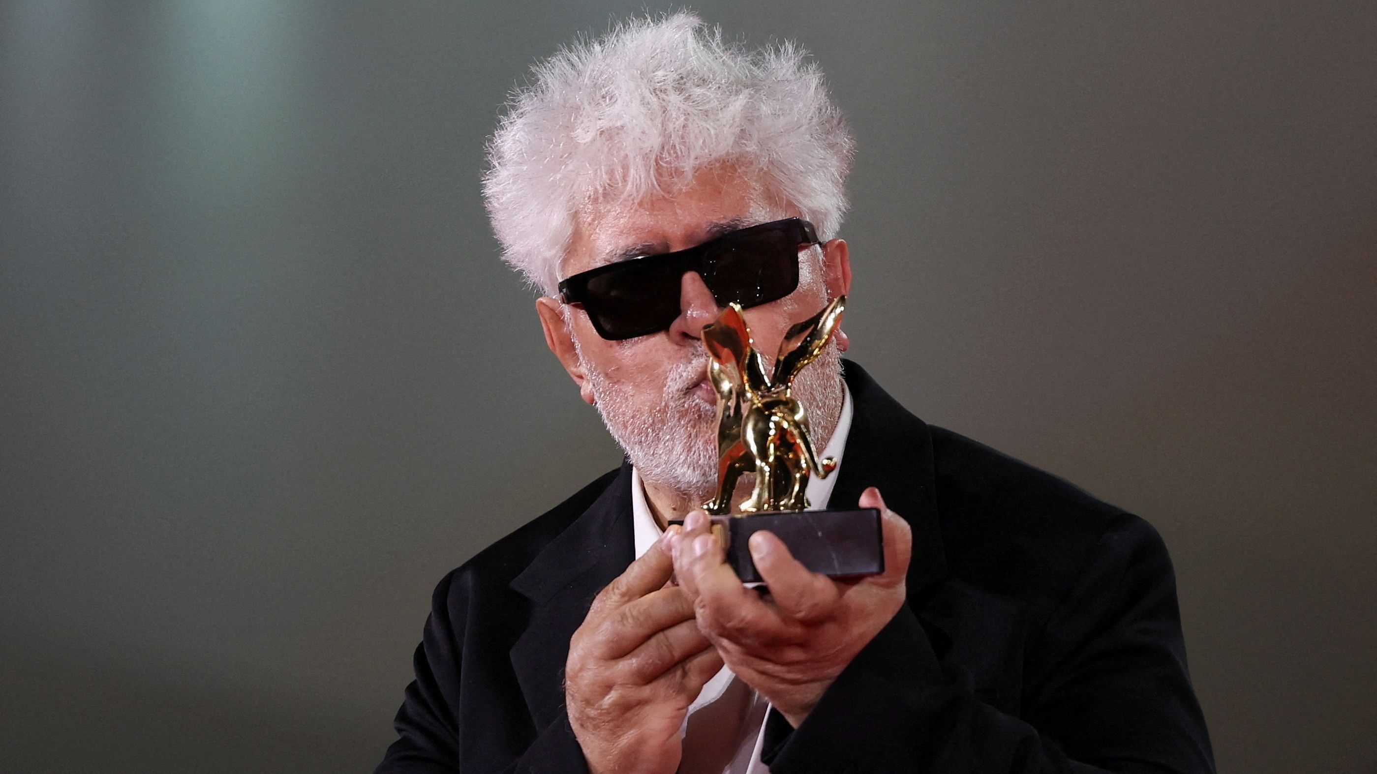 <div class="paragraphs"><p>Director Pedro Almodovar holds his Golden Lion Award for Best Film for the movie "The Room Next Door", during the 81st Venice Film Festival, Italy, September 7.</p></div>